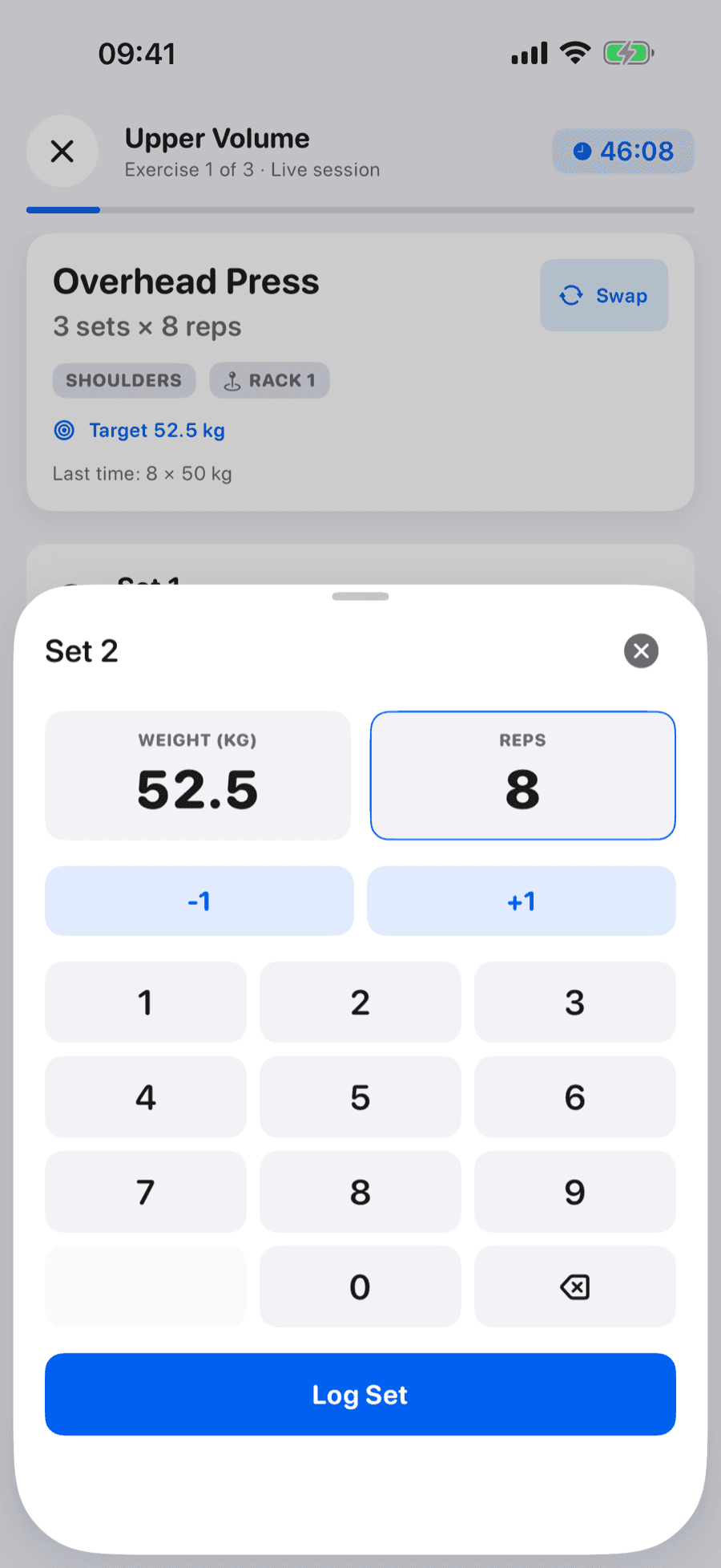 Logging a set in GymSync: Overhead Press, exercise 1 of 3 in a live session, with a target of 52.5 kg and last time's 8 × 50 kg shown, and the set pad already filled in with 52.5 kg and 8 reps above the Log Set button
